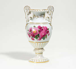 Porcelain vase with swan and flower decor