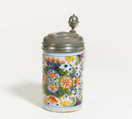Ceramic and tin tankard with crowned flower cartouche