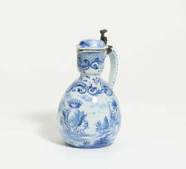 Lidded ceramic jug with countryside scenery and coat of arms