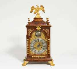 Veneered rococo commode clock with gilt bronze appliqués