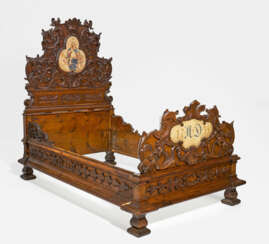 Splendid baroque fir wood bed with episcopal coat of arms