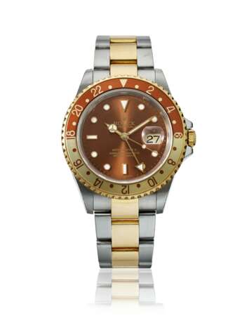 Rolex. ROLEX, STEEL AND GOLD GMT MASTER II, REF. 16713 T - фото 1