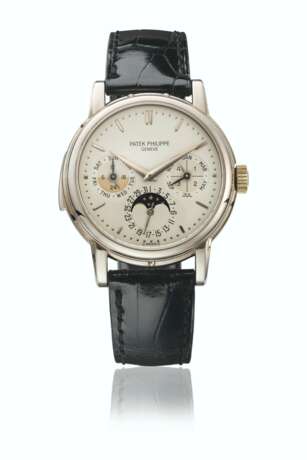 PATEK PHILIPPE. AN EXTREMELY RARE 18K WHITE GOLD AUTOMATIC MINUTE REPEATING PERPETUAL CALENDAR WRISTWATCH WITH MOON PHASES, 24 HOUR, LEAP YEAR, DAY/NIGHT INDICATION AND BOX - photo 1