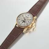 PATEK PHILIPPE. AN EXTREMELY RARE AND IMPORTANT 18K PINK GOLD PERPETUAL CALENDAR CHRONOGRAPH WRISTWATCH WITH MOON PHASES AND TACHYMETER DIAL - photo 2