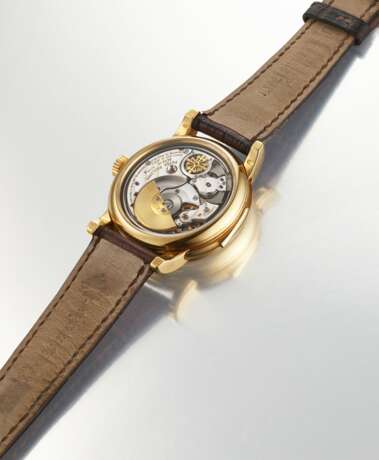 PATEK PHILIPPE. A VERY RARE 18K GOLD AUTOMATIC MINUTE REPEATING PERPETUAL CALENDAR WRISTWATCH WITH MOON PHASES, 24 HOUR, LEAP YEAR, DAY AND NIGHT INDICATION - photo 3