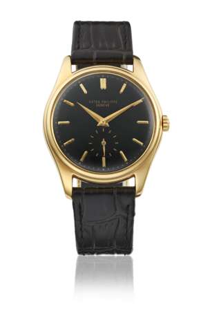 PATEK PHILIPPE. AN EXTREMELY RARE 18K GOLD AUTOMATIC WRISTWATCH WITH BLACK DIAL - Foto 1