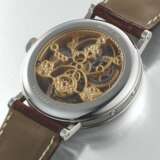 BREGUET. A RARE PLATINUM SKELETONISED PERPETUAL CALENDAR TOURBILLON WRISTWATCH WITH RETROGRADE DATE AND LEAP YEAR INDICATION - photo 2