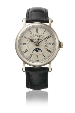PATEK PHILIPPE. A RARE AND ATTRACTIVE 18K WHITE GOLD AUTOMATIC PERPETUAL CALENDAR WRISTWATCH WITH SWEEP CENTRE SECONDS, RETROGRADE DATE, MOON PHASES, CERTIFICATE OF ORIGIN AND BOX - фото 1