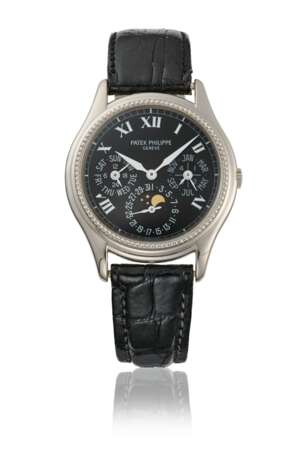 PATEK PHILIPPE. A VERY RARE 18K WHITE GOLD LIMITED SERIES AUTOMATIC PERPETUAL CALENDAR WRISTWATCH WITH MOON PHASES - фото 1
