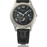 PATEK PHILIPPE. A VERY RARE 18K WHITE GOLD LIMITED SERIES AUTOMATIC PERPETUAL CALENDAR WRISTWATCH WITH MOON PHASES - фото 1