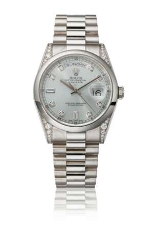 ROLEX. A RARE PLATINUM AND DIAMOND-SET AUTOMATIC WRISTWATCH WITH SWEEP CENTRE SECONDS, DAY, DATE, BRACELET, GUARANTEE AND BOX - фото 1