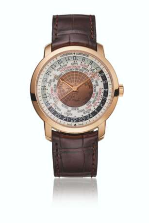 VACHERON CONSTANTIN. AN ATTRACTIVE 18K PINK GOLD AUTOMATIC WORLD TIME WRISTWATCH WITH SWEEP CENTRE SECONDS, CERTIFICATES AND BOX - photo 1