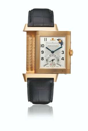 JAEGER-LECOULTRE. A VERY RARE 18K PINK GOLD LIMITED EDITION PERPETUAL CALENDAR REVERSO WRISTWATCH WITH RETROGRADE DATE, LEAP YEAR, DAY AND NIGHT INDICATION, MOON PHASES, CERTIFICATES AND BOX - фото 1