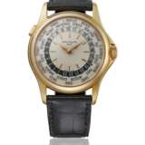 PATEK PHILIPPE. AN 18K PINK GOLD AUTOMATIC WORLD TIME WRISTWATCH WITH BOX - фото 1