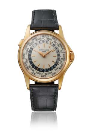 PATEK PHILIPPE. AN 18K PINK GOLD AUTOMATIC WORLD TIME WRISTWATCH WITH BOX - фото 1