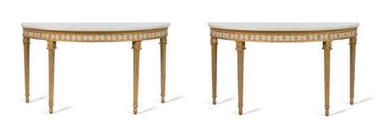 A PAIR OF GEORGE III PARCEL-GILT AND WHITE-PAINTED DEMI-LUNE SIDE TABLES - photo 1