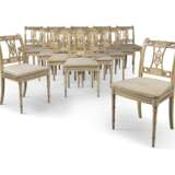 A SET OF SEVENTEEN FRENCH WHITE AND GILT-PAINTED DINING-CHAIRS - фото 1