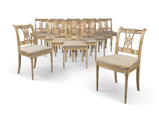 A SET OF SEVENTEEN FRENCH WHITE AND GILT-PAINTED DINING-CHAIRS - фото 1