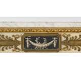 A NEAR PAIR OF FRENCH ORMOLU-MOUNTED FAUX-MARBLE, PARCEL-GILT AND EBONISED CONSOLE TABLES - photo 3