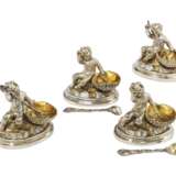 A SET OF FOUR VICTORIAN PARCEL-GILT SILVER SALT CELLARS WITH ASSORTED SPOONS - photo 1