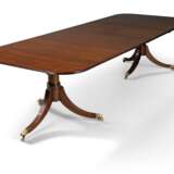 A MAHOGANY TWIN-PEDESTAL DINING-TABLE - photo 1