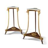 A PAIR OF CENTRAL EUROPEAN PARCEL-GILT AND GRAINED CORNER TORCHERES - фото 1