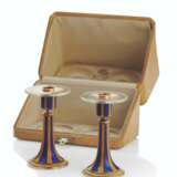 Fabergé. A PAIR OF RARE GUILLOCH&#201; ENAMEL, ROCK CRYSTAL AND TWO-COLOUR GOLD AND SILVER CANDLE STICKS - фото 1