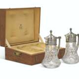 Fabergé. A PAIR OF PARCEL-GILT SILVER-MOUNTED CUT-GLASS DECANTERS - photo 1