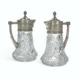 Fabergé. A PAIR OF PARCEL-GILT SILVER-MOUNTED CUT-GLASS DECANTERS - фото 2