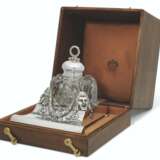 Fabergé. A PARCEL-GILT SILVER-MOUNTED GLASS INKWELL - фото 1