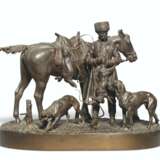 A BRONZE GROUP OF A HUNTER AND HOUNDS - фото 1