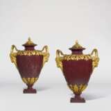 A PAIR OF RUSSIAN ORMOLU-MOUNTED KORGON PORPHYRY COVERED VASES - фото 1