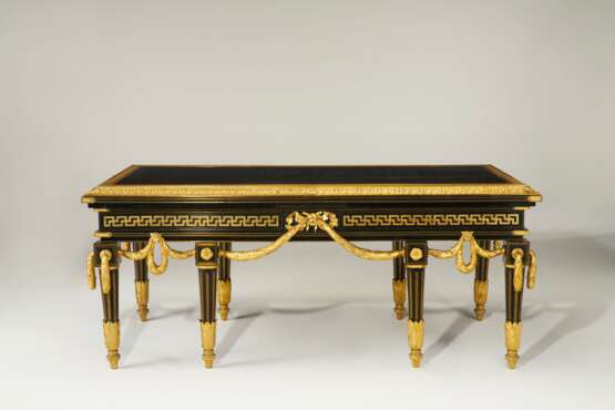 A LARGE FRENCH ORMOLU-MOUNTED AND BRASS-INLAID EBONIZED LIBRARY TABLE - photo 1