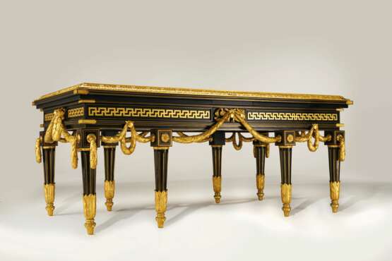 A LARGE FRENCH ORMOLU-MOUNTED AND BRASS-INLAID EBONIZED LIBRARY TABLE - photo 2