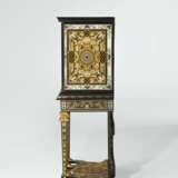 A LOUIS XIV PEWTER AND BRASS-INLAID EBONY, PARCEL-GILT AND BOULLE MARQUETRY CABINET-ON-STAND - фото 3