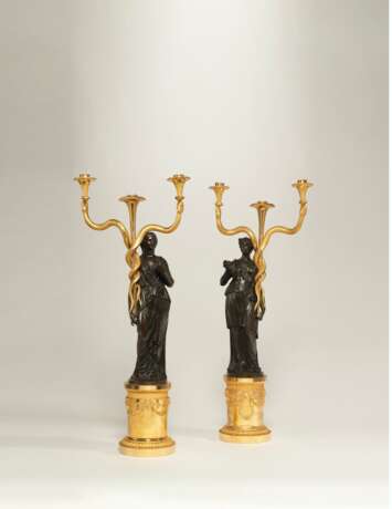 A PAIR OF CONSULAT ORMOLU AND PATINATED BRONZE THREE-LIGHT CANDELABRA - photo 1