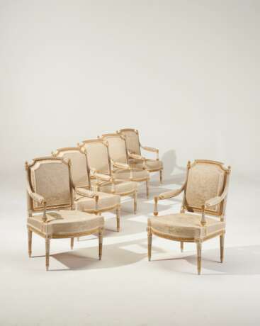 A SET OF SIX LOUIS XVI GRAY-PAINTED AND PARCEL-GILT FAUTEUILS - photo 1