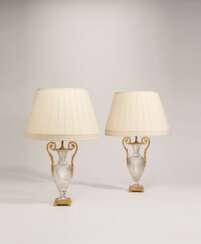 A PAIR OF FRENCH ORMOLU-MOUNTED CUT-GLASS TWO-HANDLED VASES, MOUNTED AS LAMPS