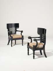 A PAIR OF FRENCH EBONIZED FAUTEUILS