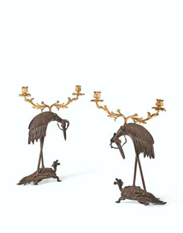 A PAIR OF FRENCH ORMOLU AND PATINATED BRONZE TWO-LIGHT CANDELABRA - photo 1
