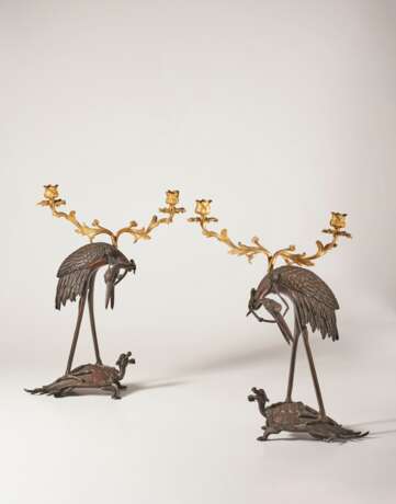 A PAIR OF FRENCH ORMOLU AND PATINATED BRONZE TWO-LIGHT CANDELABRA - photo 2