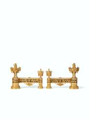A PAIR OF FRENCH ORMOLU AND PATINATED BRONZE CHENETS
