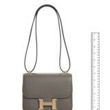 HERMÈS. AN ÉTAIN SWIFT LEATHER MINI CONSTANCE 18 WITH ROSE GOLD HARDWARE - photo 5