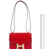 HERMÈS. A SHINY ROUGE DE COEUER ALLIGATOR MINI CONSTANCE 18 WITH GOLD HARDWARE - фото 6