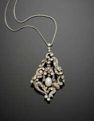 Diamond white gold volute pendant/brooch with a central swinging element holding a pearl drop Diamond white gold volute pendant/brooch with a central swinging element holding a pearl drop