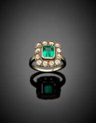 Octagonal emerald and diamond white gold cluster ring