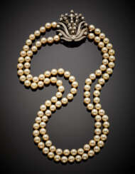 Two strand cultured mm 9/9.50 circa pearl necklace with white gold diamond clasp adaptable as brooch