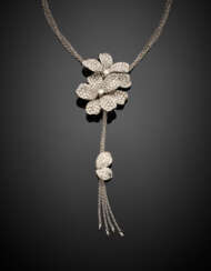 Four strand white gold chain necklace with a diamond pavé flower central holding a chain tassel with diamond leaves