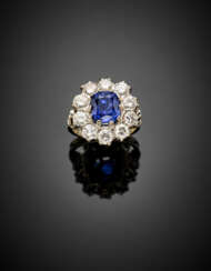 Cushion shape ct. 3.25 circa sapphire and round diamond white gold cluster ring