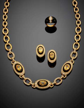 Oval yellow sapphire and diamond yellow gold and black enamel jewelry set comprising - photo 1